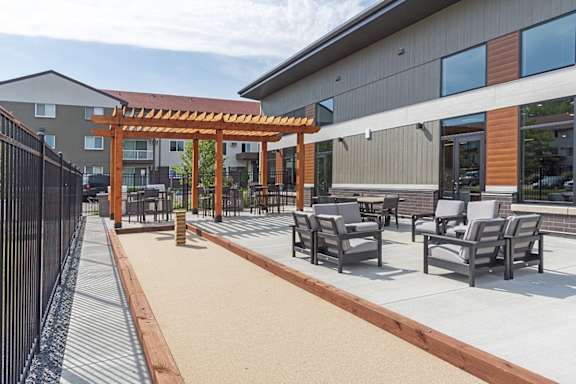 ConnellyApartmentsBurnsvilleMNOutsideBocceBallCourtPatioArea