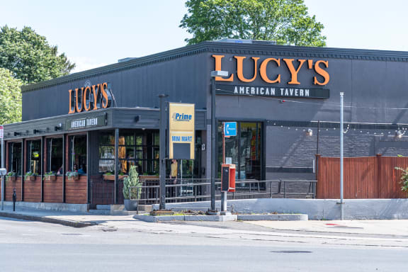A sign for The Fours Restaurant and Sports Bar.