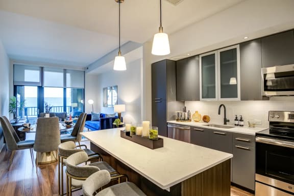 an open floor plan with a kitchen and living room