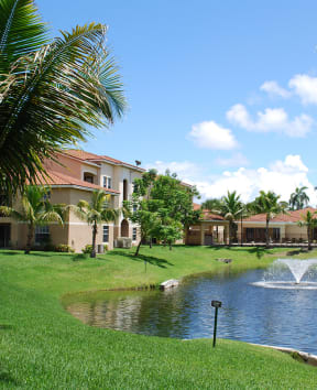 Portofino Apartments lake views with water fountain and community exteriors
