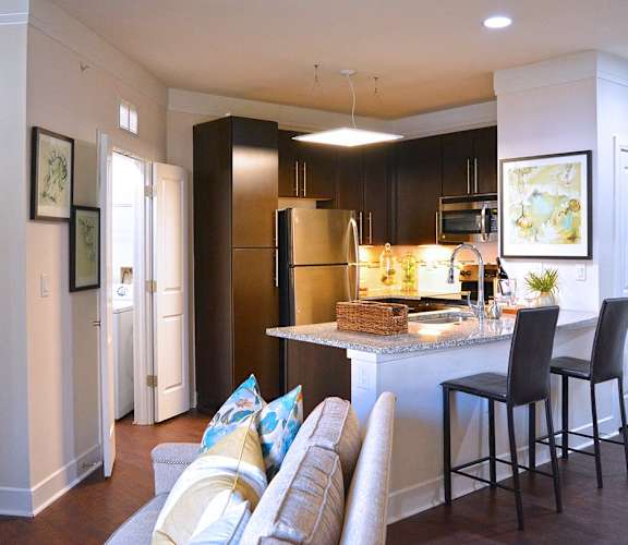 Fitted Kitchen With Island Dining at Vanguard Crossing, St. Louis, 63124