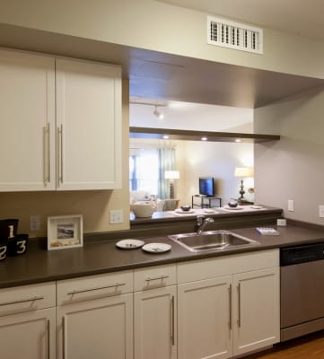 Kitchen with Modern Finishes and Stainless Steel Appliances. 