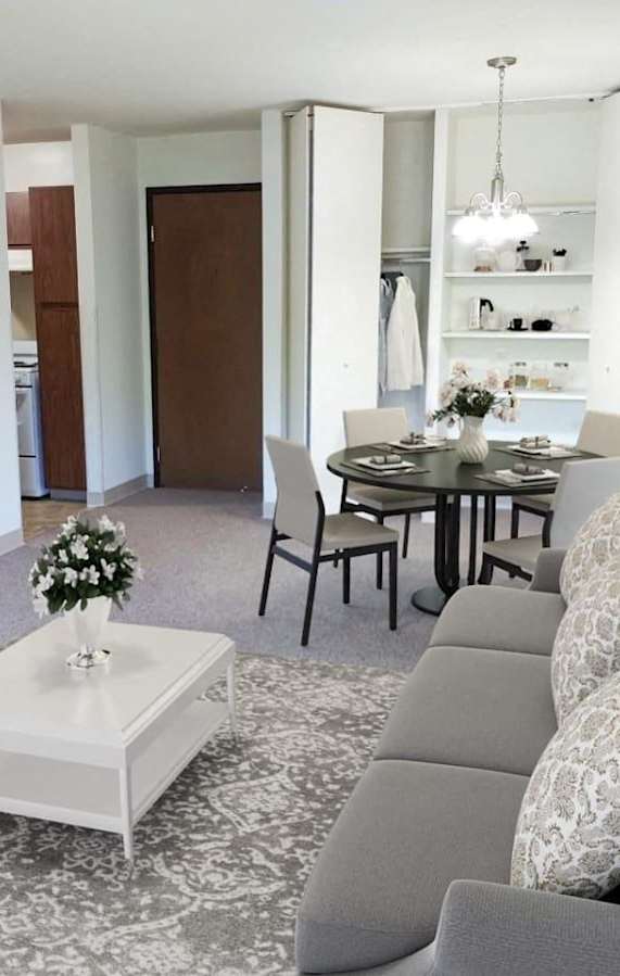 a kitchen with a sink and a refrigerator
