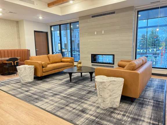 a living room with couches and a coffee table