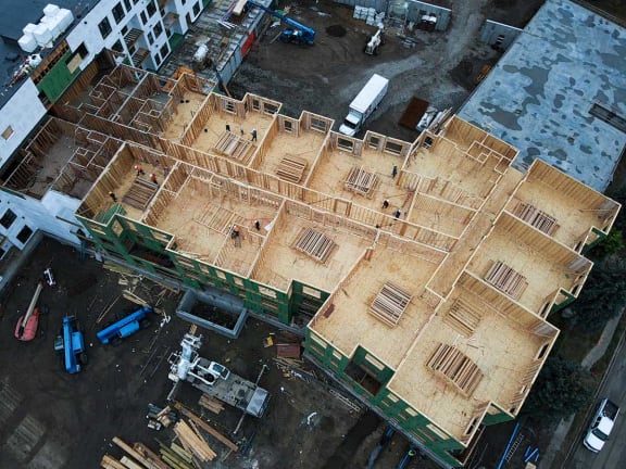 an aerial view of a building under construction with scaffolding