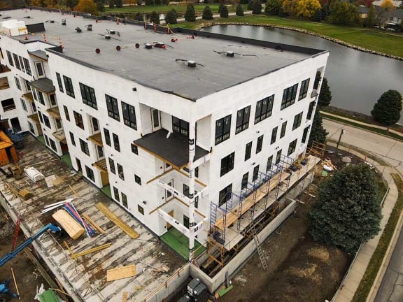 an aerial view of an apartment building under construction