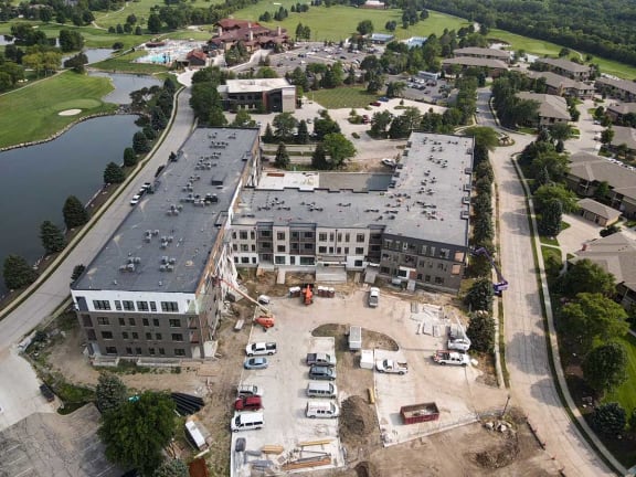 an aerial view of a building under construction in a city