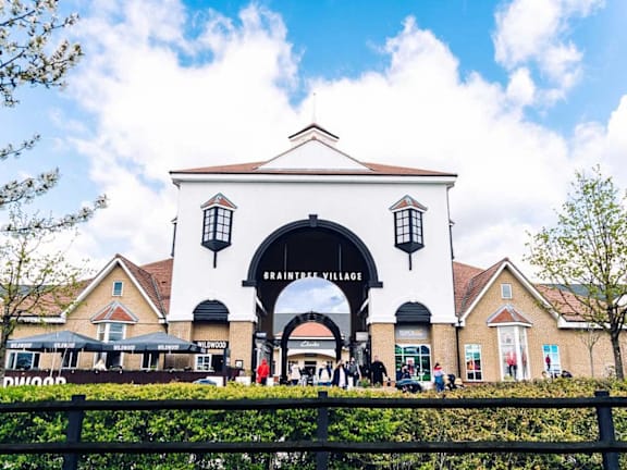 the front of a building with an arched entrance