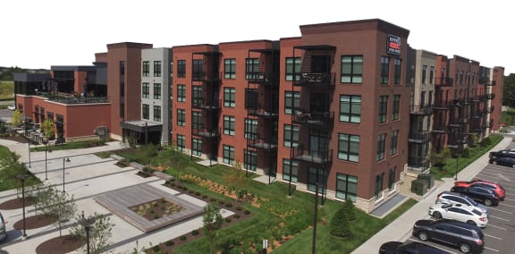 an aerial view of a building with a parking lot at Wildhorse Apartments, Chesterfield, Missouri