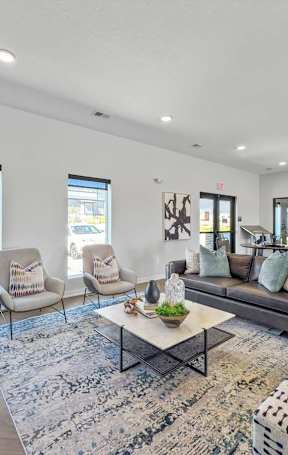 A modern dining room with a table set for six.
