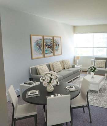 a living room with a couch and a table