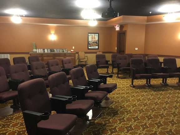 A row of brown seats in a room.