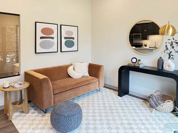 a rendering of a living room and dining room  in apartment at Brynwood at Wilderness Ridge
