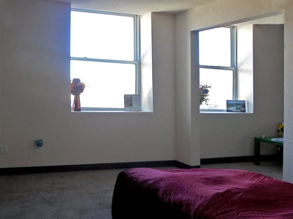 Bedroom with natural lighting at Hoffman Hotel Apartments