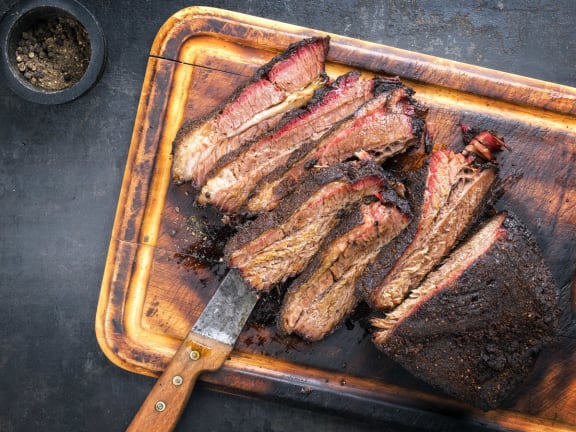 Smoked Brisket on a cutting board at Mirabella Apartments, Bermuda Dunes, 92203