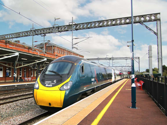 a train on the tracks at a train station