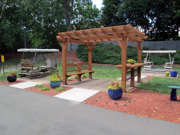 Outdoor sitting area at Franklin Square Manor Apartments in New Britain, CT.