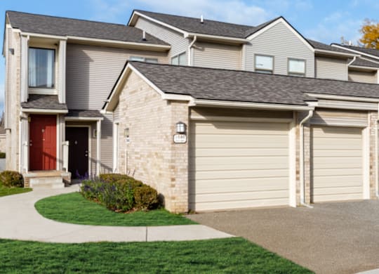 a row of garages on the side of a house