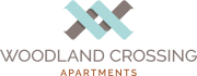the logo for woodlands crossing apartments with the words woodland crossing apartments at Woodland Crossing , Woodland, CA 95695
