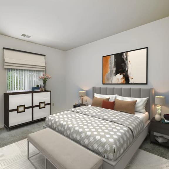 a bedroom with a bed and a table and a window