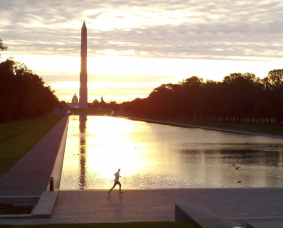 Beautiful sunset over river near The DeSoto Apartments Building in Washington, DC 20005