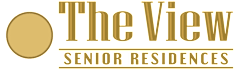A logo for "The View Senior Residences" with a gold circle to the left of the text.