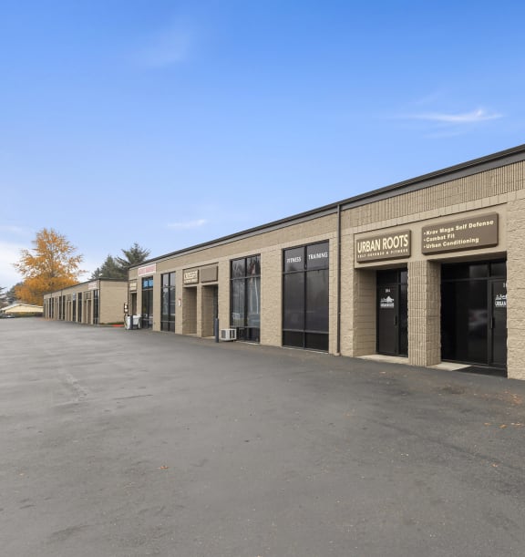 Park 219 Business Park Store Fronts and Parking Lot