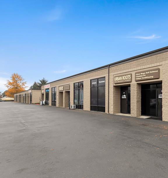 Park 219 Business Park Store Fronts and Parking Lot