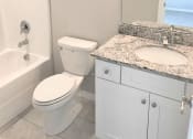 Thumbnail 32 of 60 - B3 (1-car) Guest Bath with granite countertops, sink, toilet, shower