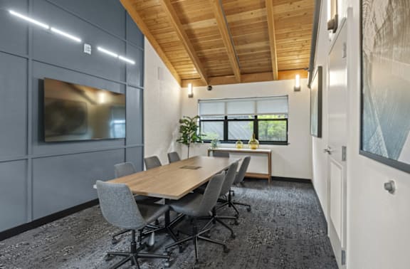 a kitchen with wooden cabinets and a counter top at The Lakes Apartments in Bellevue, WA, 98007