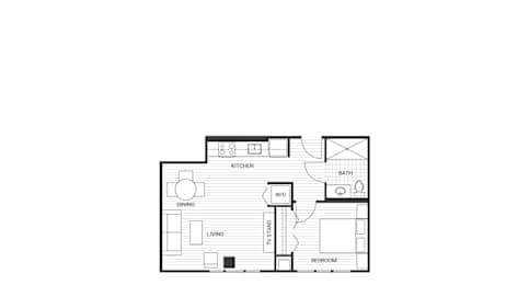 A floor plan of a small apartment with a kitchen, living room, and bathroom.