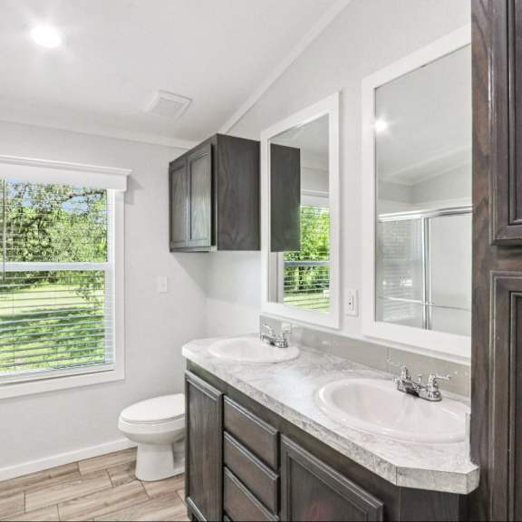 Primary Bathroom at Woodview Apartments, Austin, TX