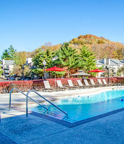 a swimming pool at the resort on a sunny day