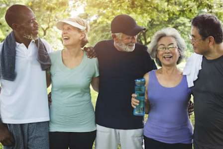 A group of people standing together outdoors.