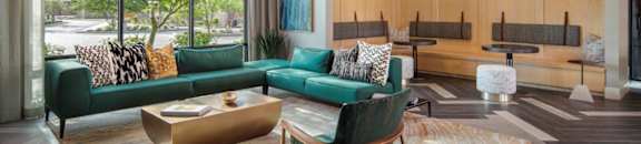 a living room filled with furniture and a large window at Zaterra Luxury Apartments, Chandler, AZ, 85286