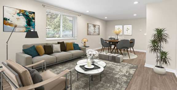 Sofa and painting in a living room at Kingsbrook Arms, Englewood, Co 80113