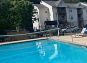 Thumbnail 3 of 6 - an aerial view of a swimming pool on the top of a building
