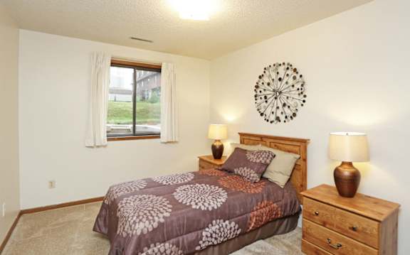 Well lit bedroom at Park Place Apartments, Coralville, IA 52241