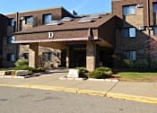 Thumbnail 4 of 11 - Woodland North Apartments exterior front building