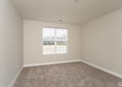 Thumbnail 17 of 28 - The Ervin Master Suite Bedroom  at The Flats on Houk, Delaware, Ohio
