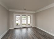 Thumbnail 20 of 28 - The Ervin Living Room with Gorgeous French Doors  at The Flats on Houk, Delaware, OH, 43015