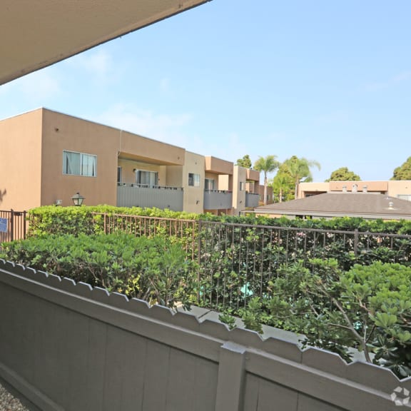 a view of the balconies at the whispering winds apartments in pearland, tx