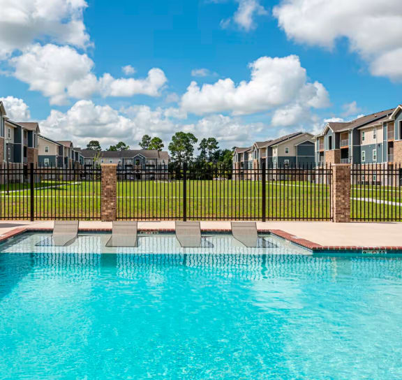 take a dip in the resort style pool at villas at houston levee west apartments