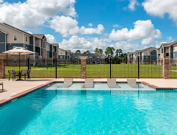take a dip in the resort style pool at villas at houston levee west apartments