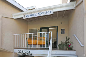 Banner sign indicating entrance to Leasing Office