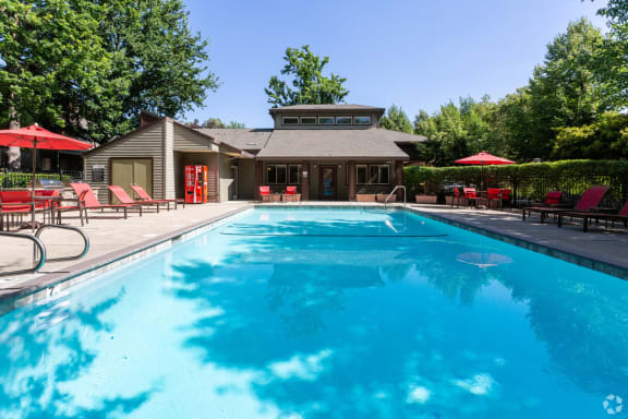 Apartments for Rent in Citrus Heights, CA-The Reva- Sparkling Pool with Lounge Seating and Umbrellas