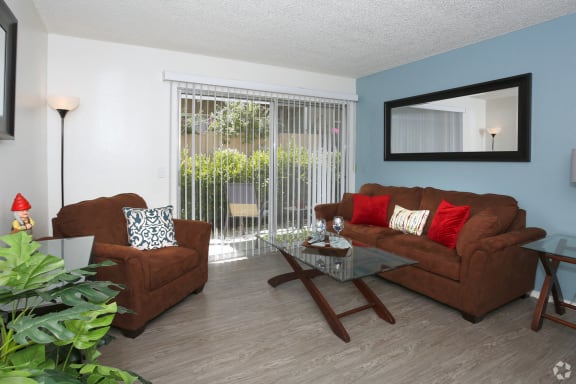 Spacious Living Room area with couch and love seat