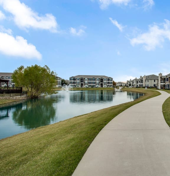 a walkway along the water at Orion Prosper Lakes, Prosper, 75078