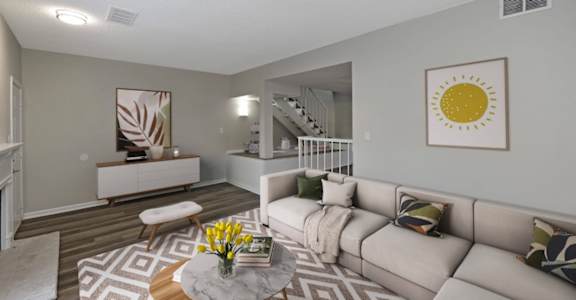 our apartments offer a living room with a couch and a coffee table