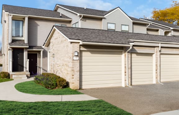 a row of garages on the side of a house